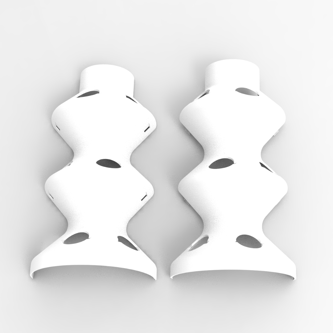 A single palm leaf in a clear glass of water on a white background.